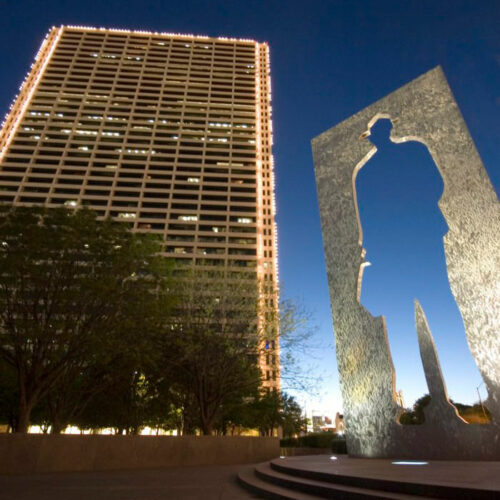 Man With a Briefcase statue outside Burnett Plaza